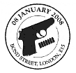 postmark showing pistol and bullets.